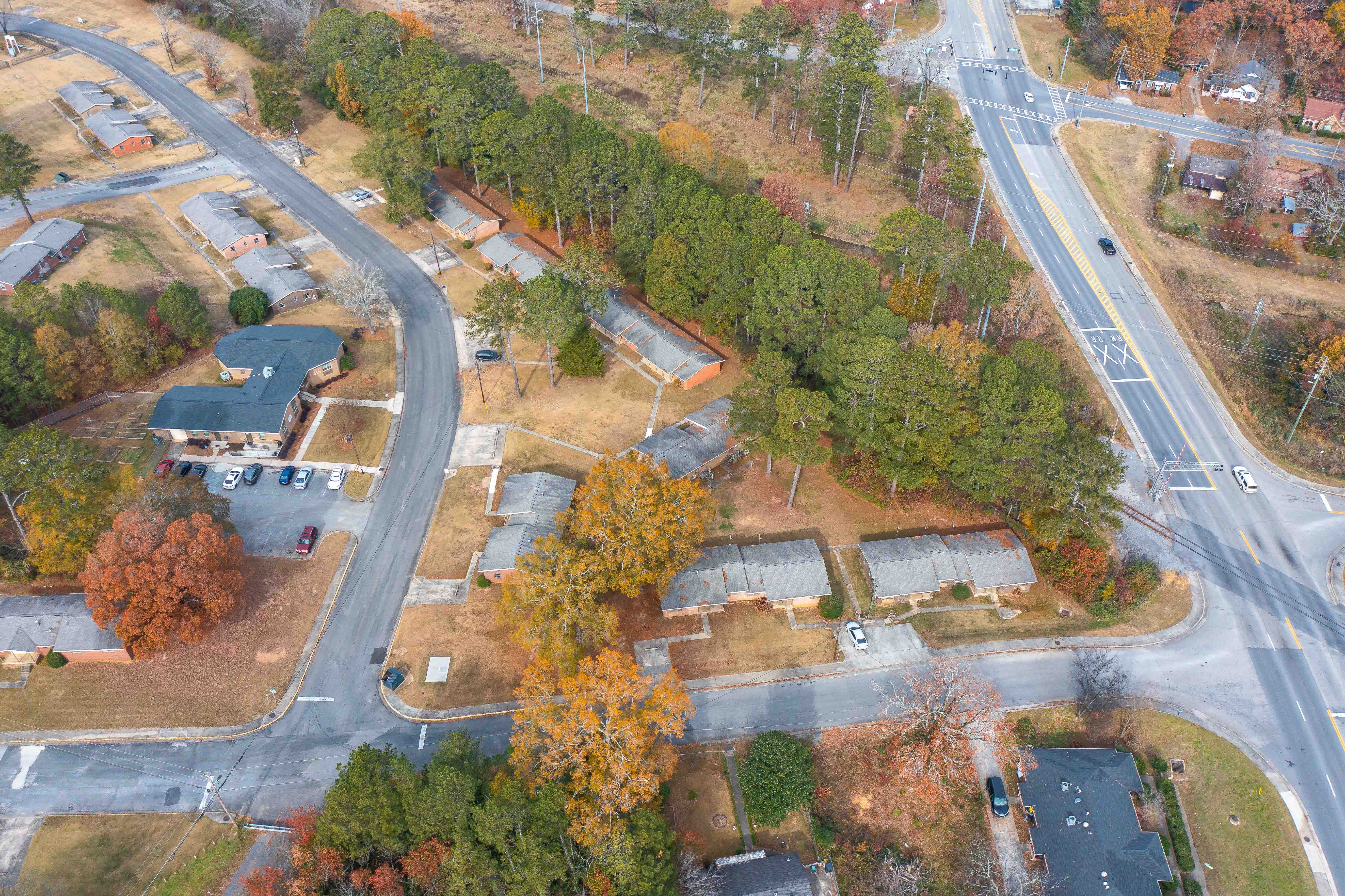 A road with a car driving on it.
